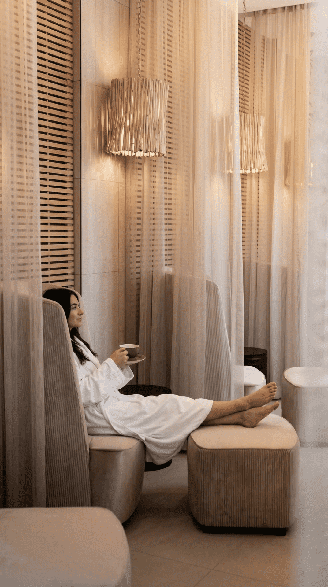 Luxury spa relaxation lounge at Beverly Beauty with comfortable seating and natural lighting